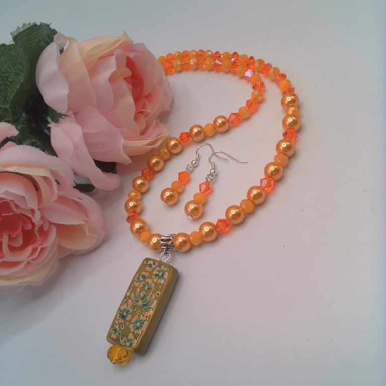 Peach Rectangle with Floral Pattern on an Orange and Peach Necklace & Earrings 