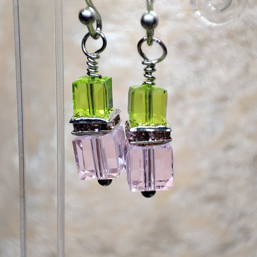 Crystal earrings with silver plated wires, pink and green 