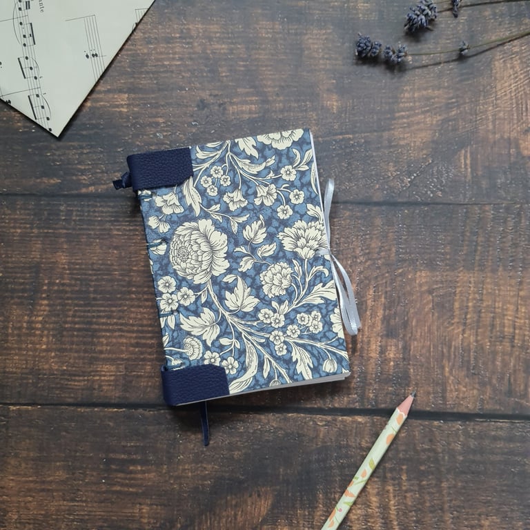 Handmade floral A6 journal, with Coptic stitching and leather detail