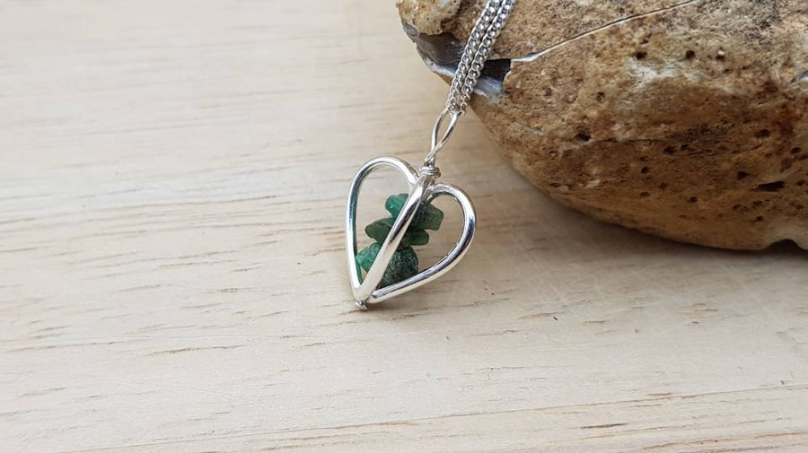 3D Heart Raw Emerald pendant necklace. May birthstone