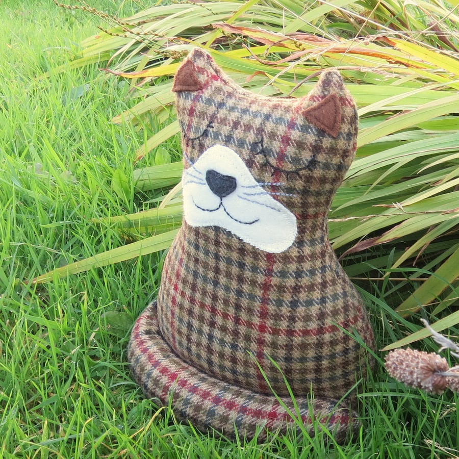 Alfred. A snoozy cat doorstop, made from a tactile tweed wool.