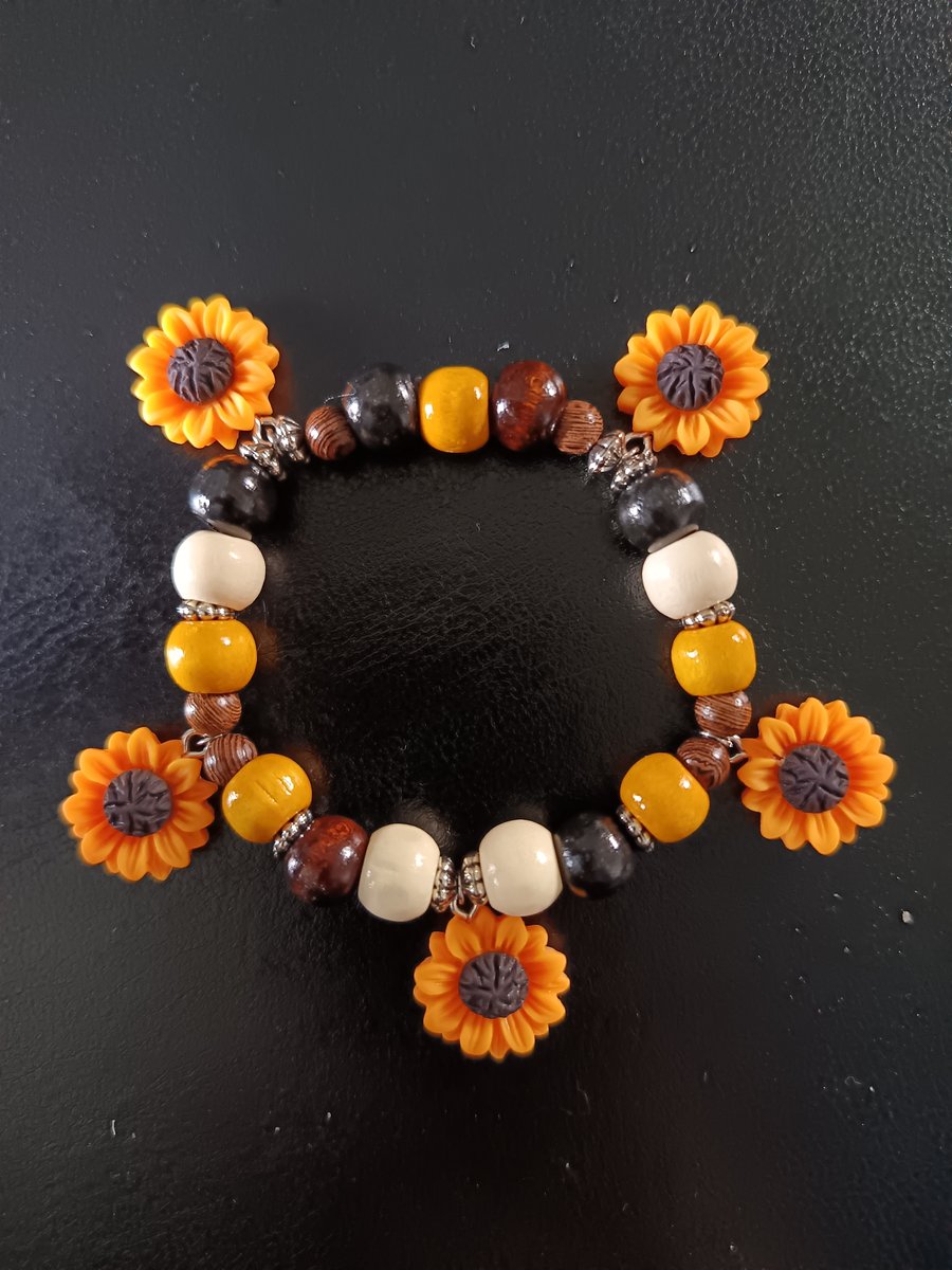 Elasticated sunflower charm bracelet with wooden beads