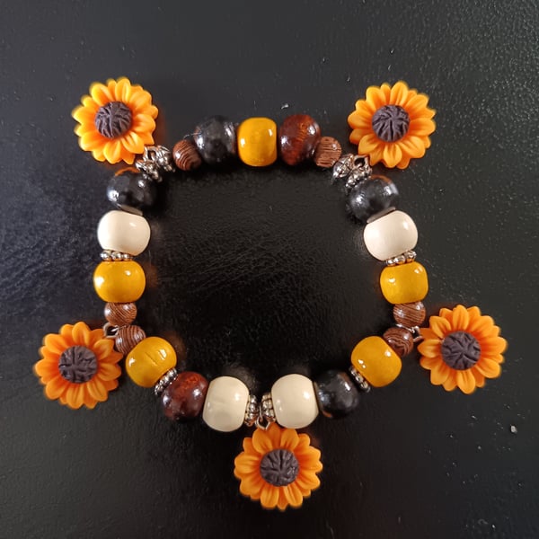 Elasticated sunflower charm bracelet with wooden beads
