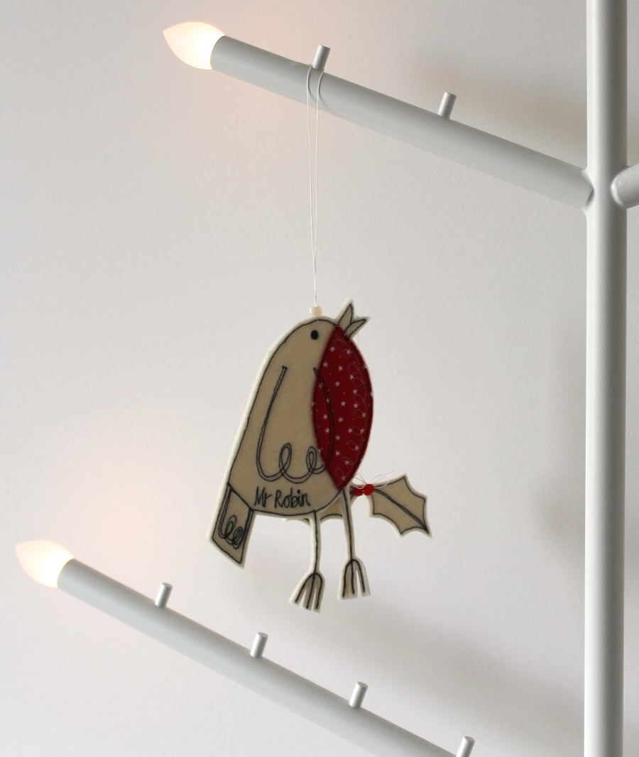Mr Robin is holding Holly - Hanging Decoration