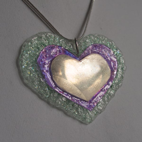 Super size three layer heart pendant.