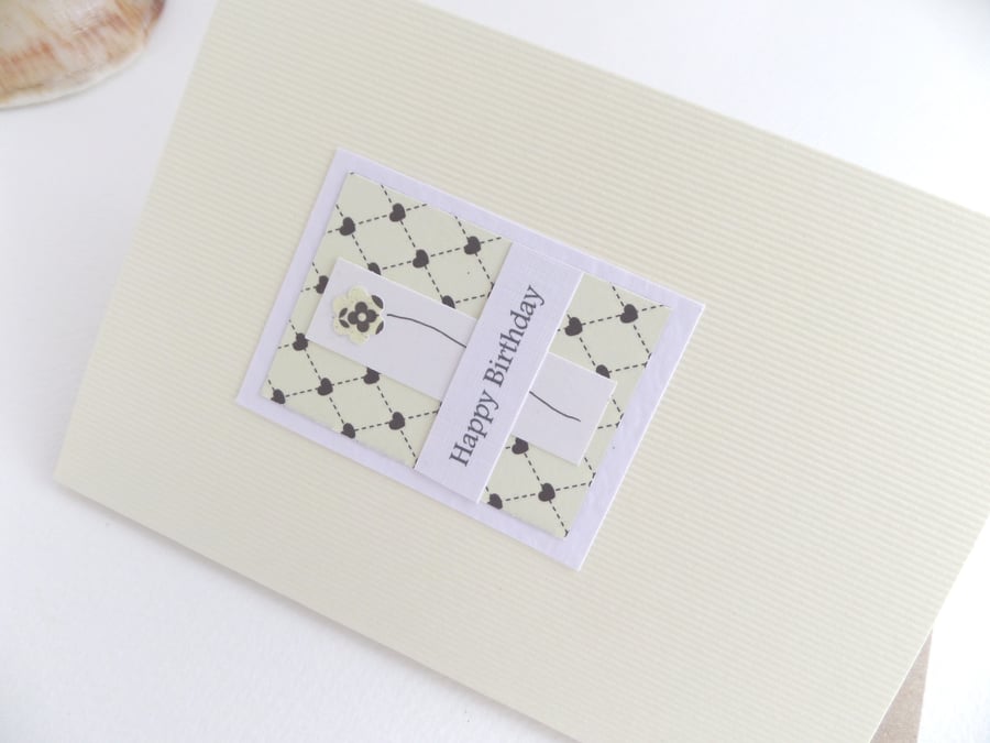Simple Birthday Card, Ivory Flowers Says Happy Birthday.