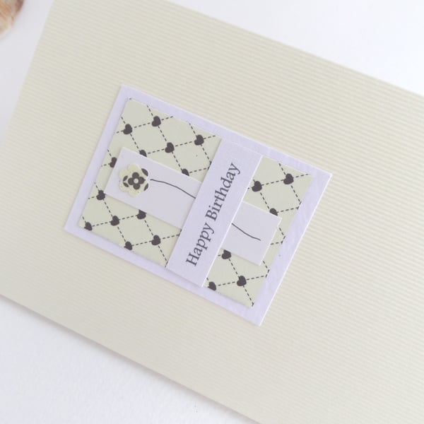 Simple Birthday Card, Ivory Flowers Says Happy Birthday.