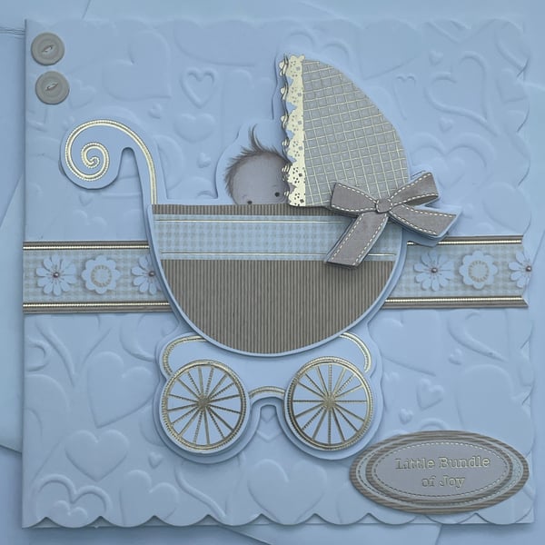 Little bundle of joy baby in a pram new baby card