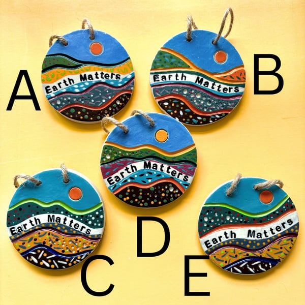 EARTH MATTERS-HANGING CERAMIC DISCS 