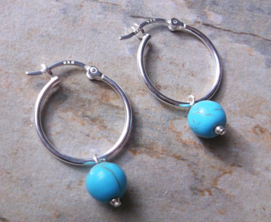 Sterling Silver 20mm Hinged Hoop Earrings with Grade A Turquoise Gemstones.