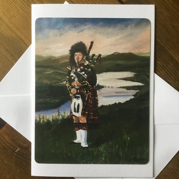 Lone Piper At Loch Garry, Art Greetings card. Blank inside.