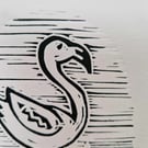 Lino printed flamingo on pink card. Size A5.