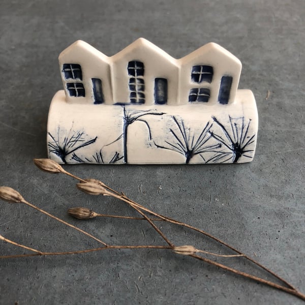 Ceramic row of little houses. 