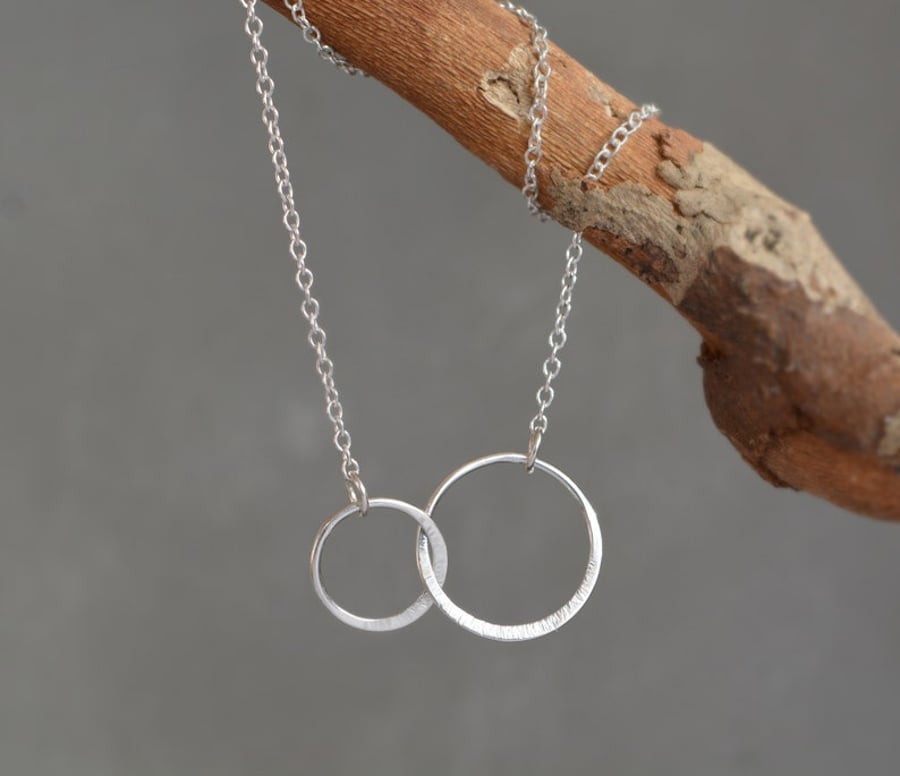 Double circle sterling silver necklace. Interlocking necklace. Entwined circles.