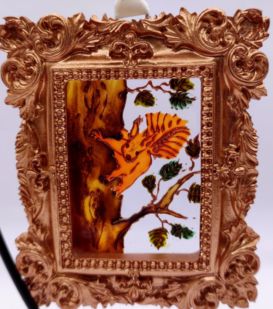 Handmade glass painted window hanging or Christmas tree bauble