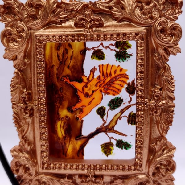 Handmade glass painted window hanging or Christmas tree bauble