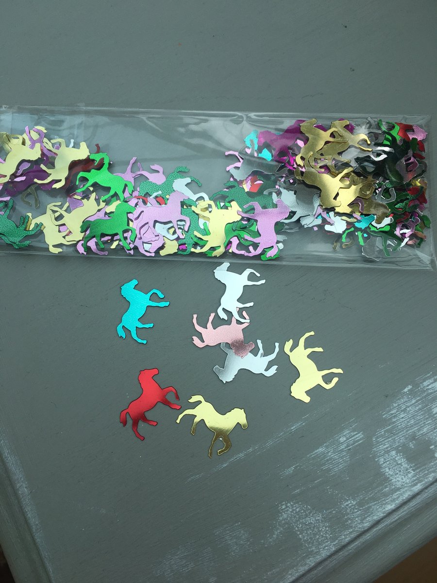 Multicoloured horse shaped table confetti