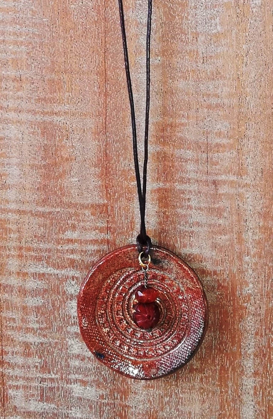 Ceramic dangle with amber beads