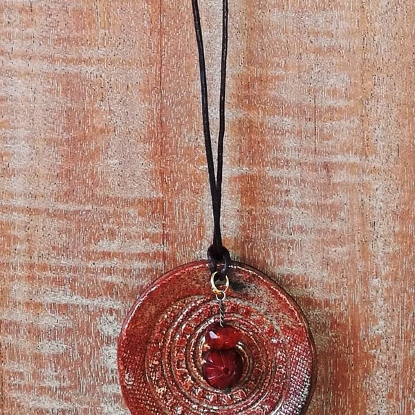 Ceramic dangle with amber beads