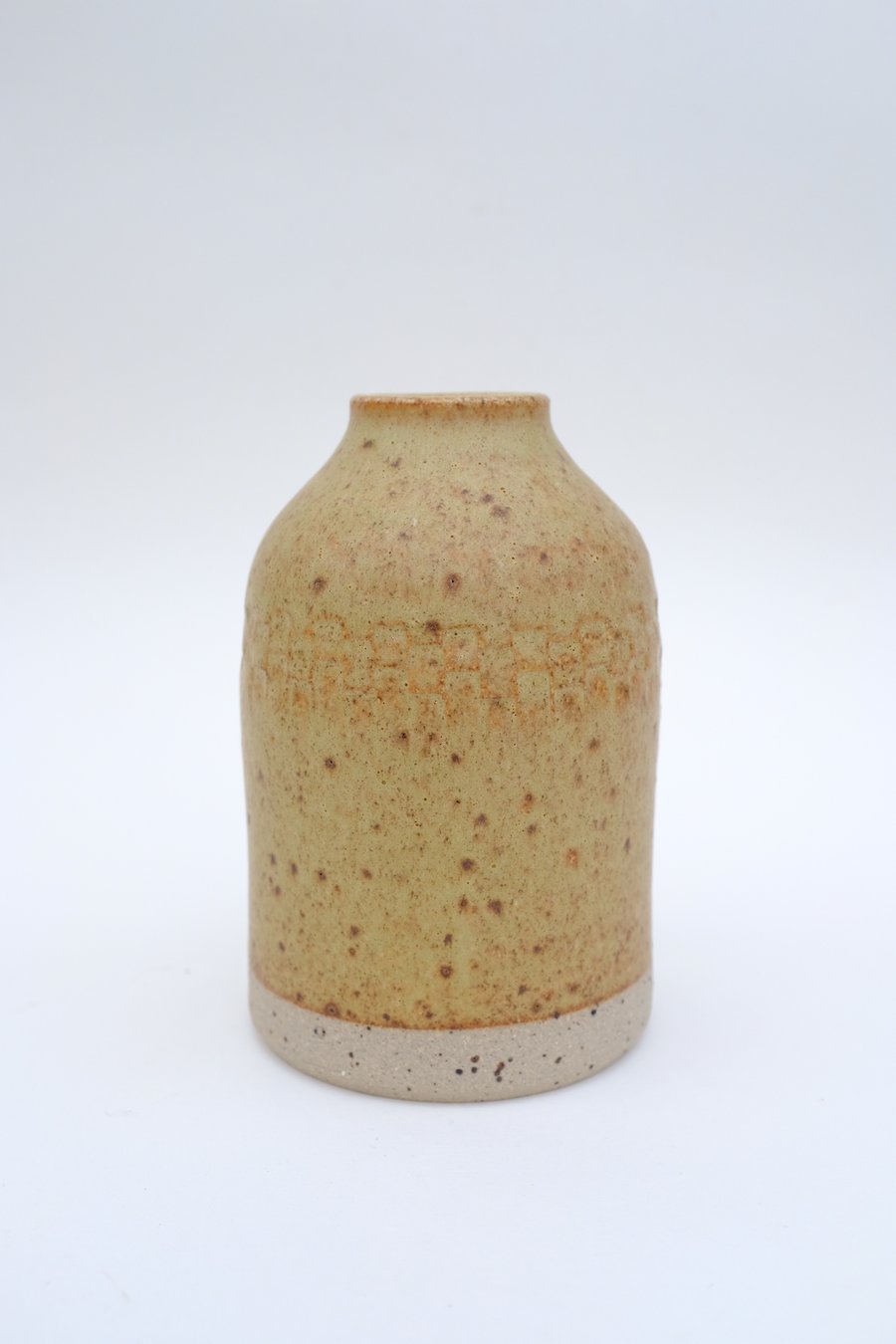 Yellow stoneware bottle