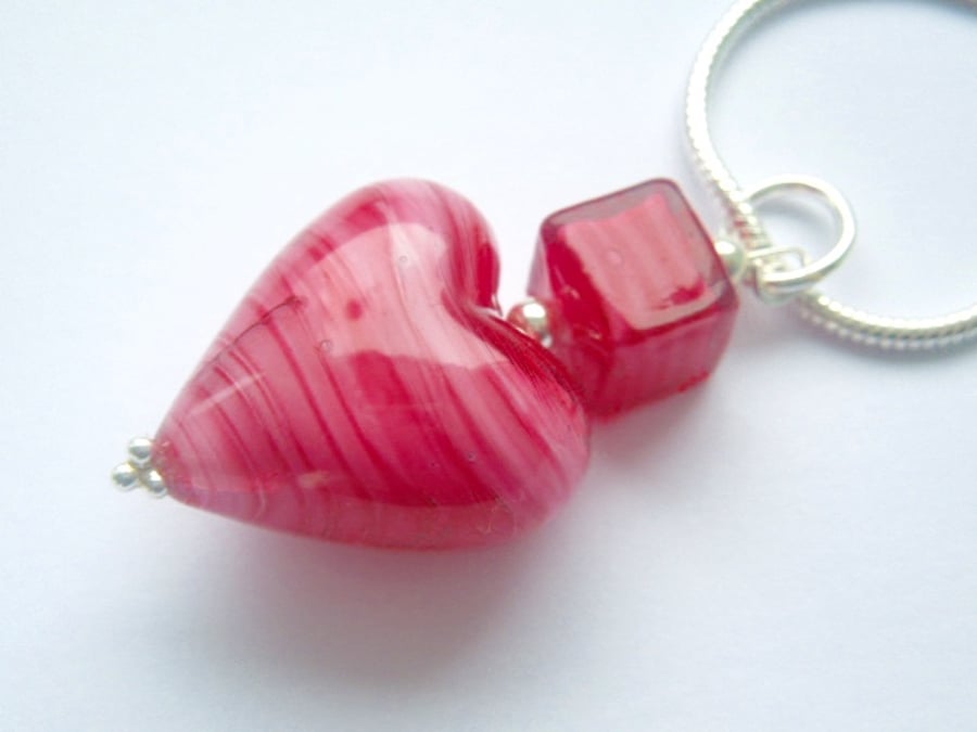 Murano glass pink heart pendant with sterling silver.