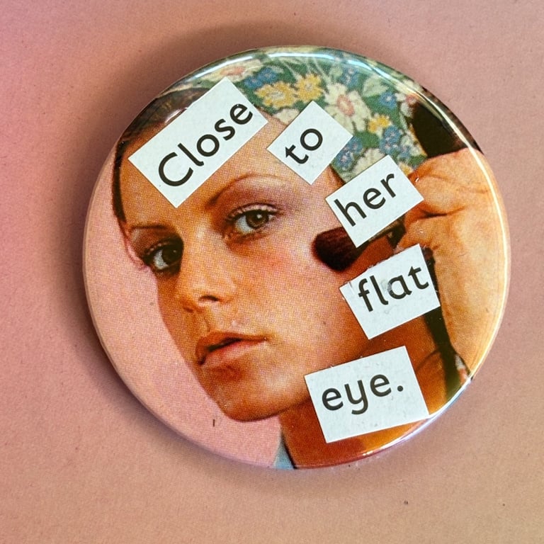 Collage pin badge - close to her flat eye