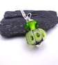 black and lime bubbles lampwork glass pendant