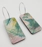 Rectangular shaped wooden earrings with a printed scribble effect design - Image 5