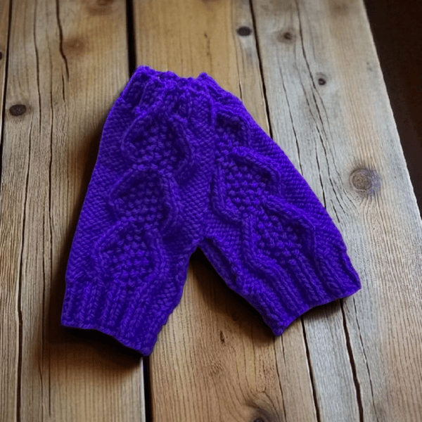 Hand knitted hand warmers