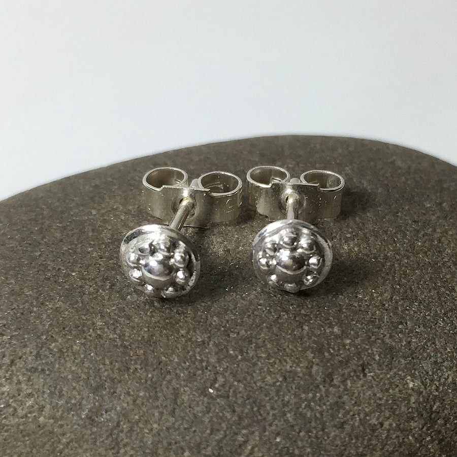Tiny sterling silver daisy stud earrings