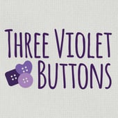 Three Violet Buttons