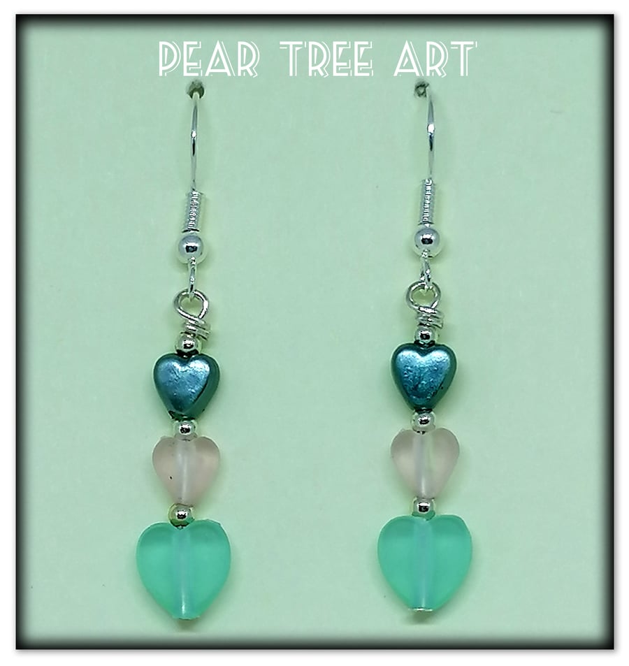 Small heart bead earrings on Silver  plated hooks.