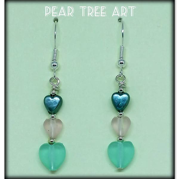 Small heart bead earrings on Silver  plated hooks.