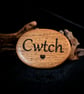 Cwtch Solid Oak Keepsake Pebble. Handmade Welsh Gift - Image 1
