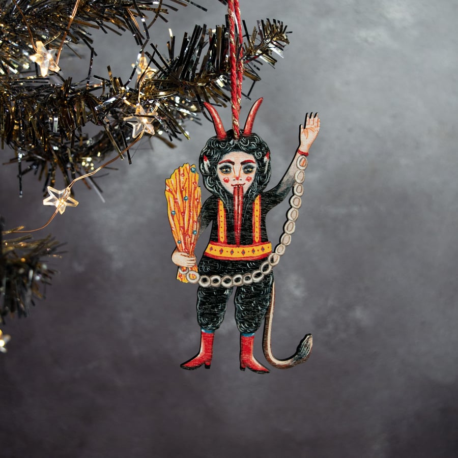 Waving Christmas Krampus hanging decoration, made from laser cut wood