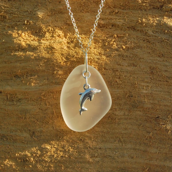 Beach glass pendant with sterling silver dolphin