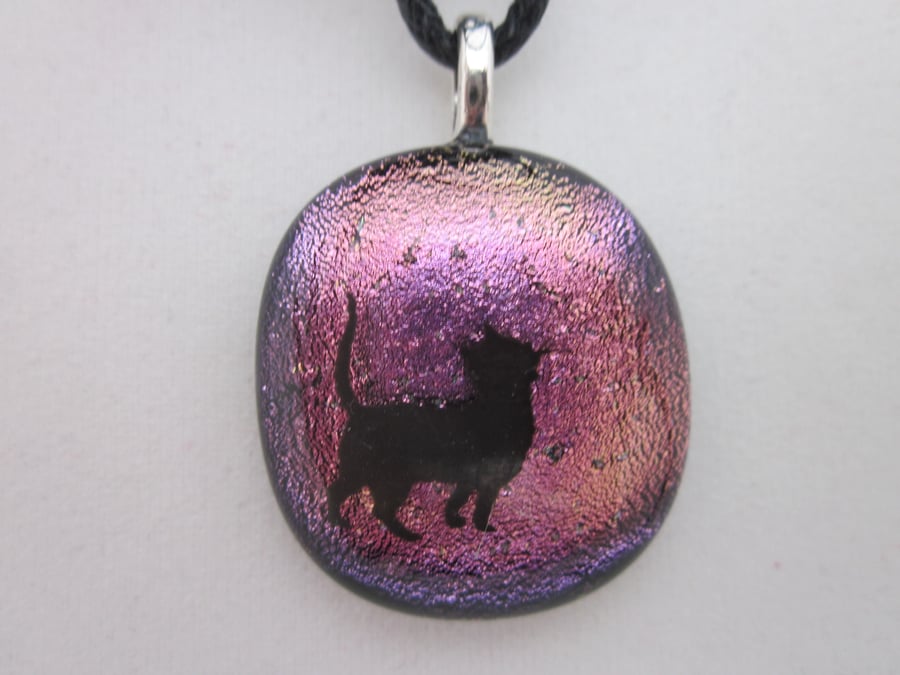 Handmade dichroic glass cabochon pendant - pink with black enamel cat