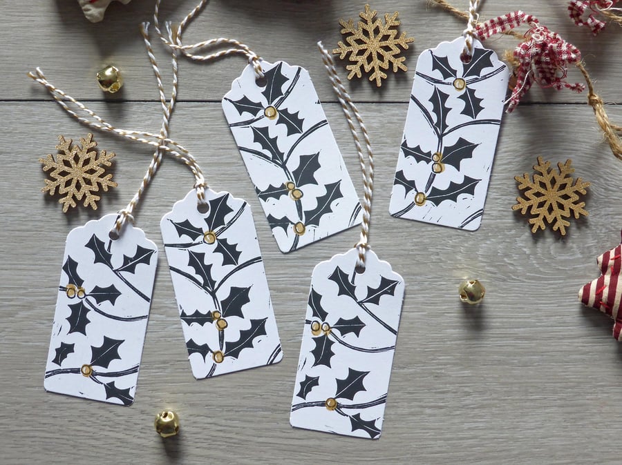 Handprinted Christmas gift tags with holly and gold berries
