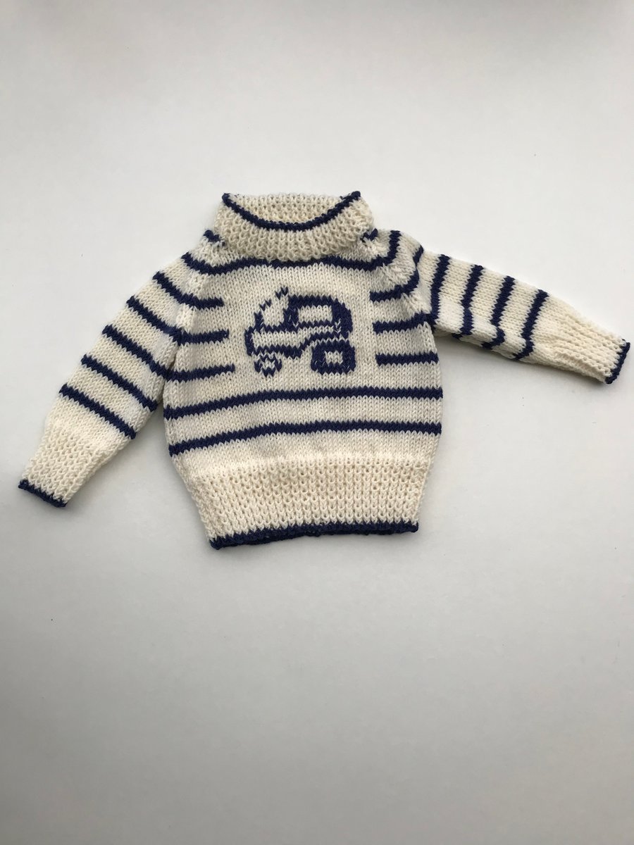 Luxurious baby jumper with a tractor design