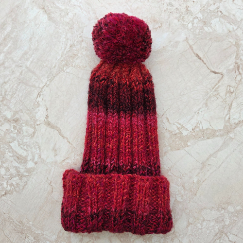 Hand knitted adult red multicoloured bobble hat