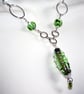 Green Foil Lined Glass Pendant Necklace - Silver Spiral Wirework Jewellery