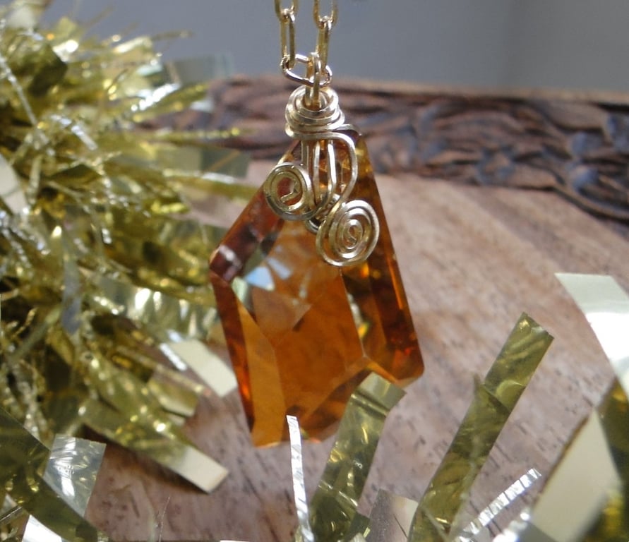 Wire wrapped copper coloured Swarovski Crystal Pendant on a gold chain Rare