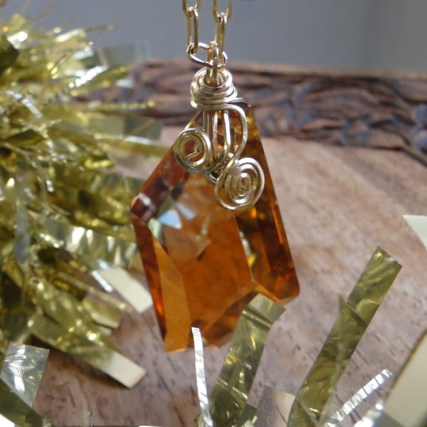 Wire wrapped copper coloured Swarovski Crystal Pendant on a gold chain Rare