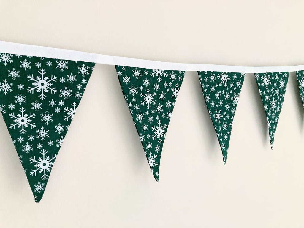 Green with White snowflakes fabric bunting. Double sided.