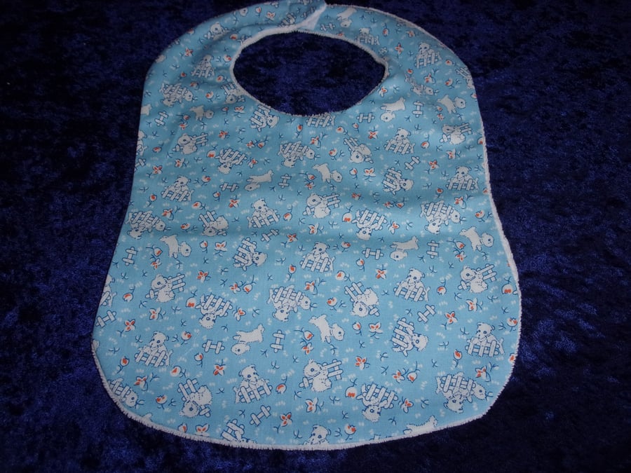 Babies Bib with Lambs on a Blue Background