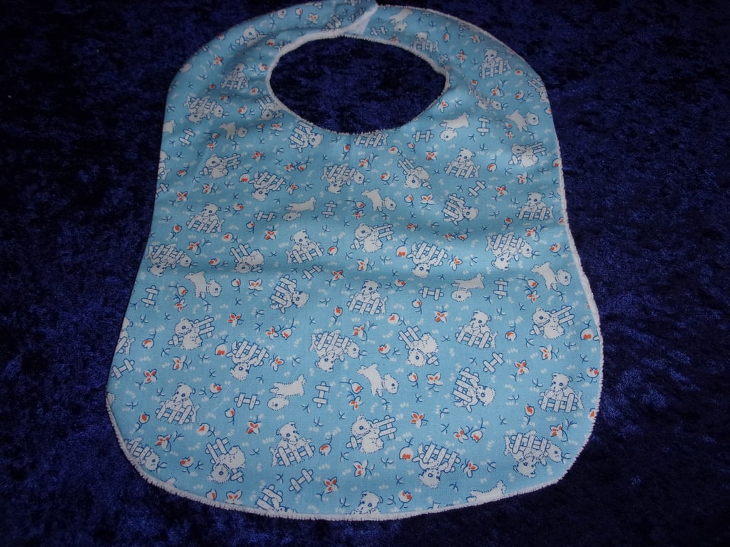 Babies Bib with Lambs on a Blue Background