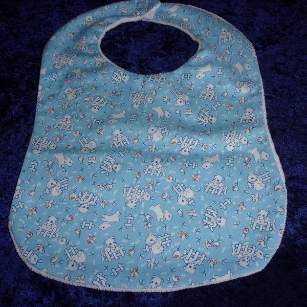 Babies Bib with White Rabbits on a Blue Background