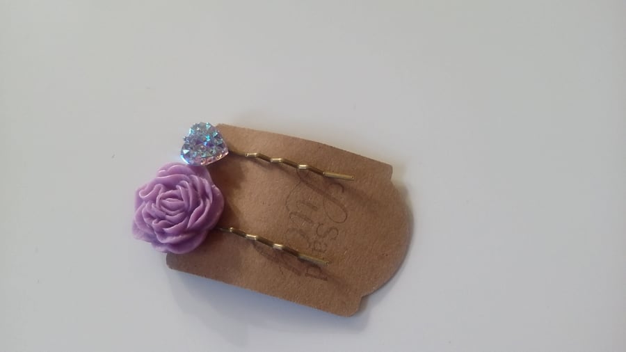 Purple flower and silver coloured heartbobby pins