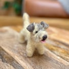 Small fuzzy felt dog