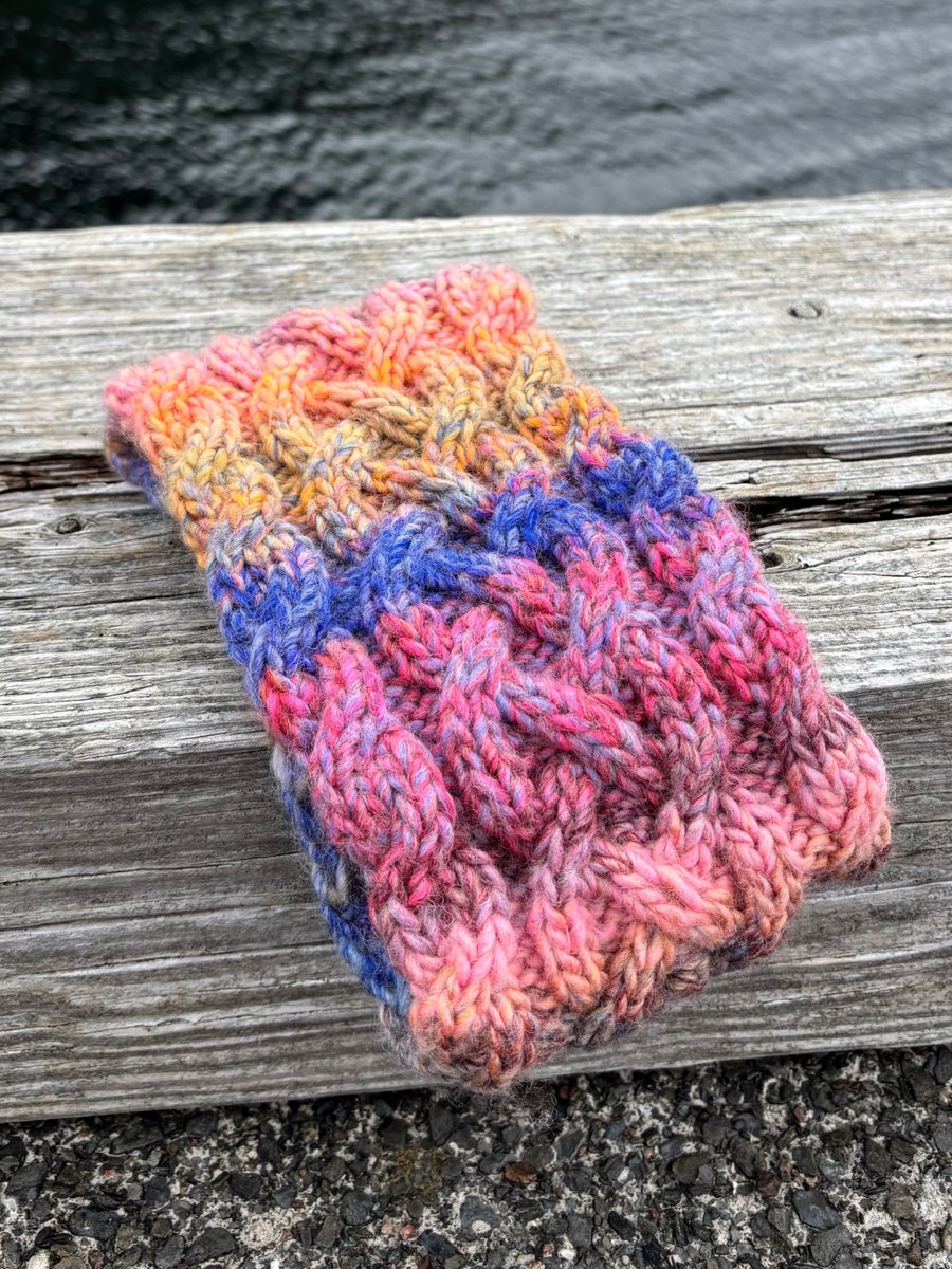 Hand knitted, lined headband featuring Celtic knot pattern 
